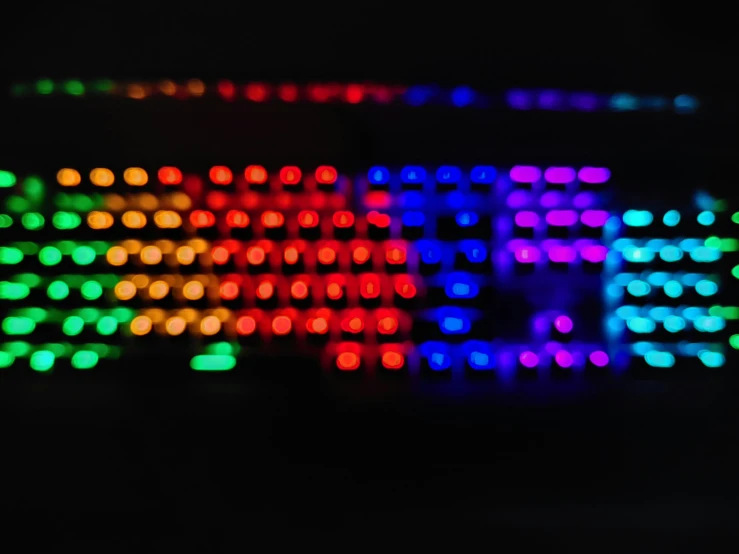 colorful leds in a dark background with one glowing