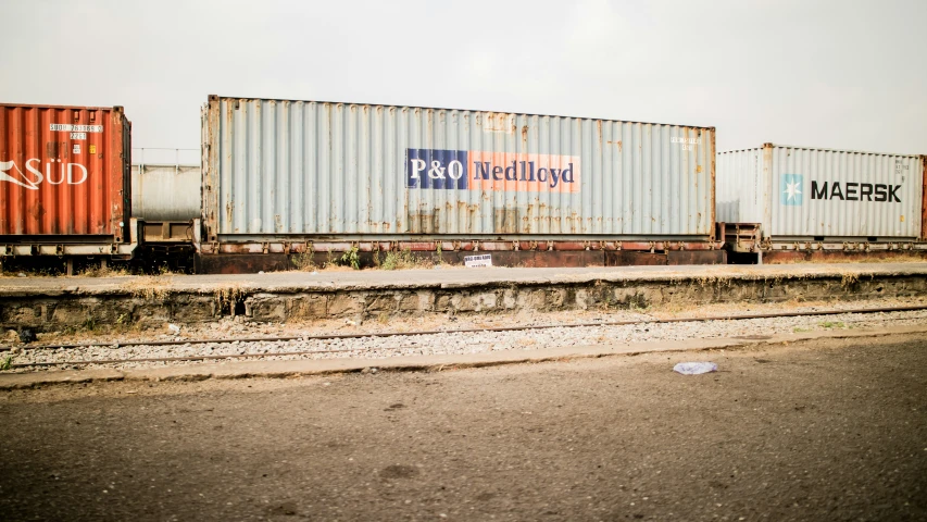 a long train with some containers on it