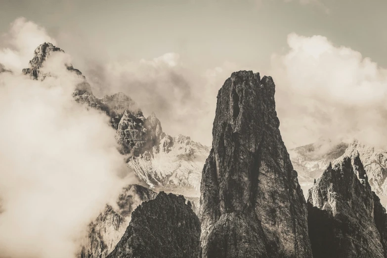 some very pretty mountains that are covered in clouds