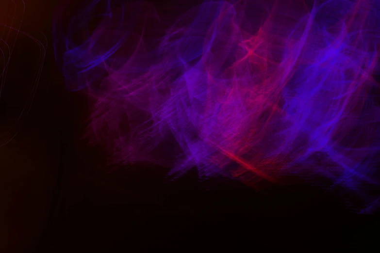 red and blue light streaks on the wall