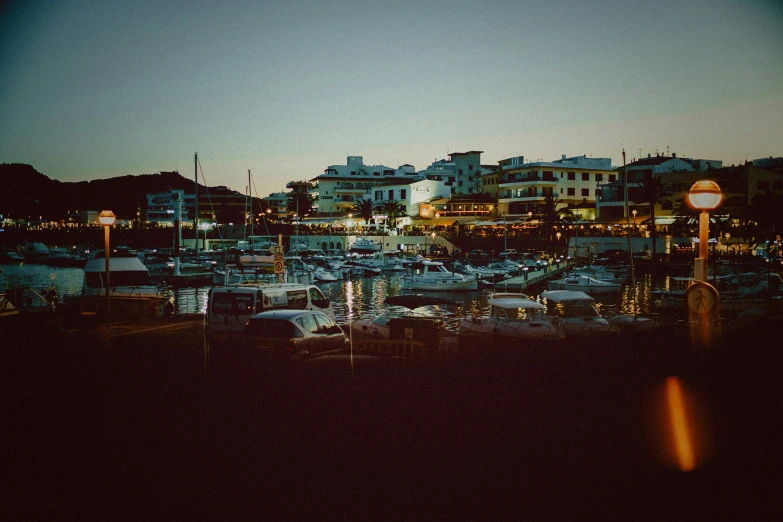 a harbor filled with lots of boats and lots of tall buildings