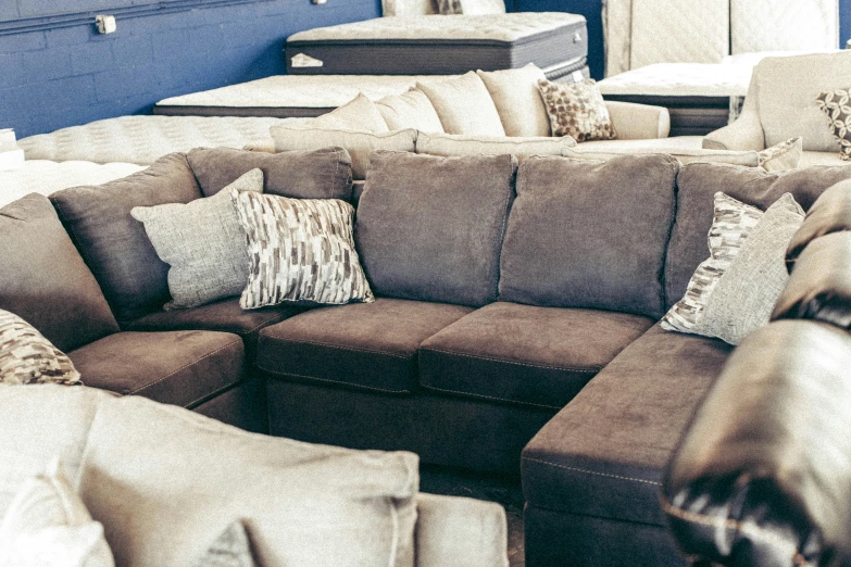 an array of couches in a living room and sitting area