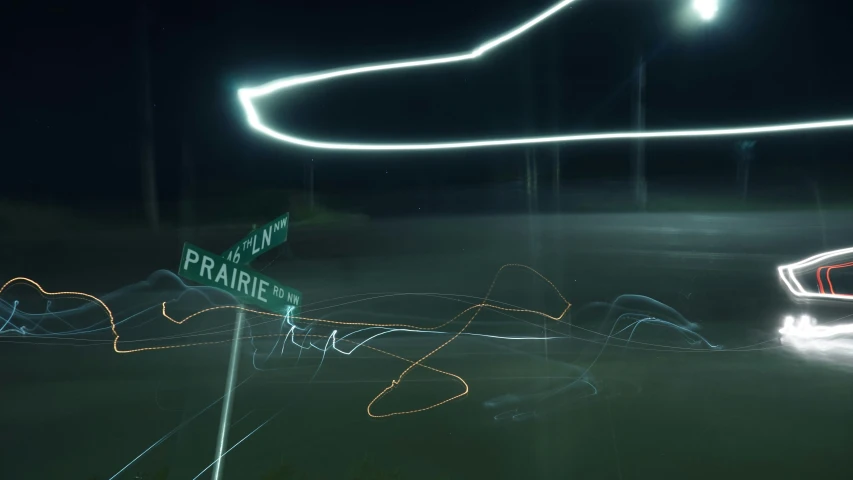 light painted pographs of streets with cars going by at night