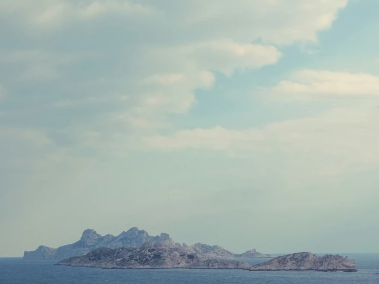 a bird flies through the air over an island