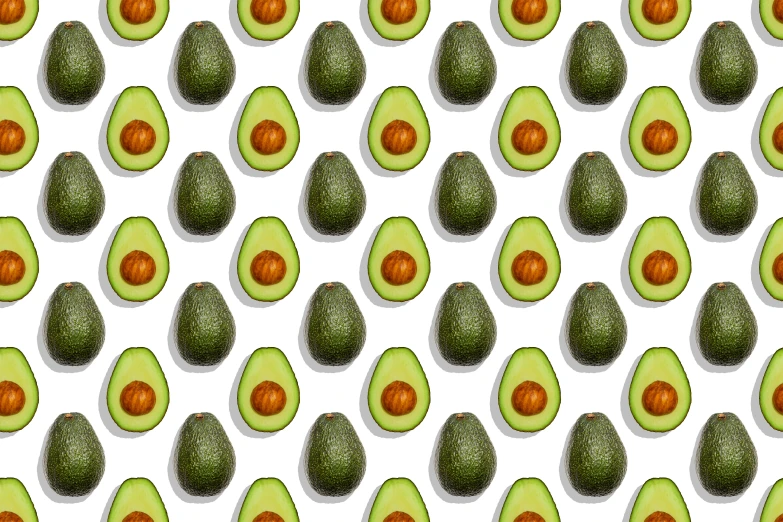 an avocado pattern on the side of a white backdrop