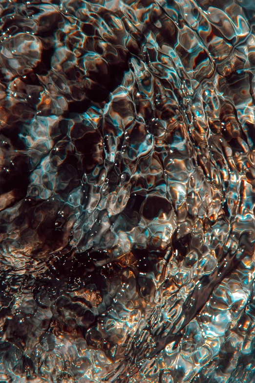 a view of water from the bottom with bubbles