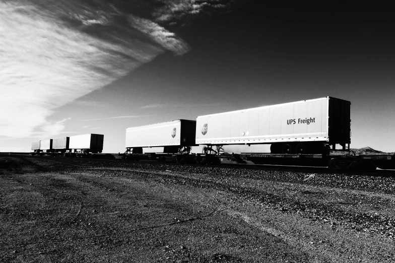 a very big rig truck traveling down the road