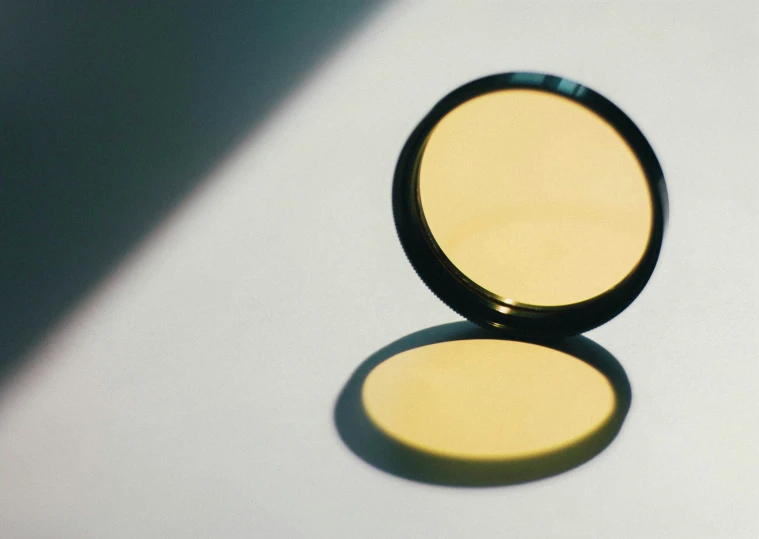 two shadows of the pressed yellow powder