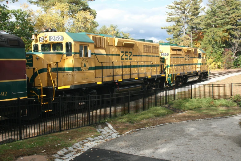 the locomotive train is going down the train track