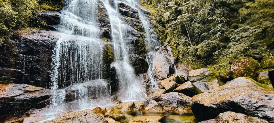 waterfall in the forest with water flowing down