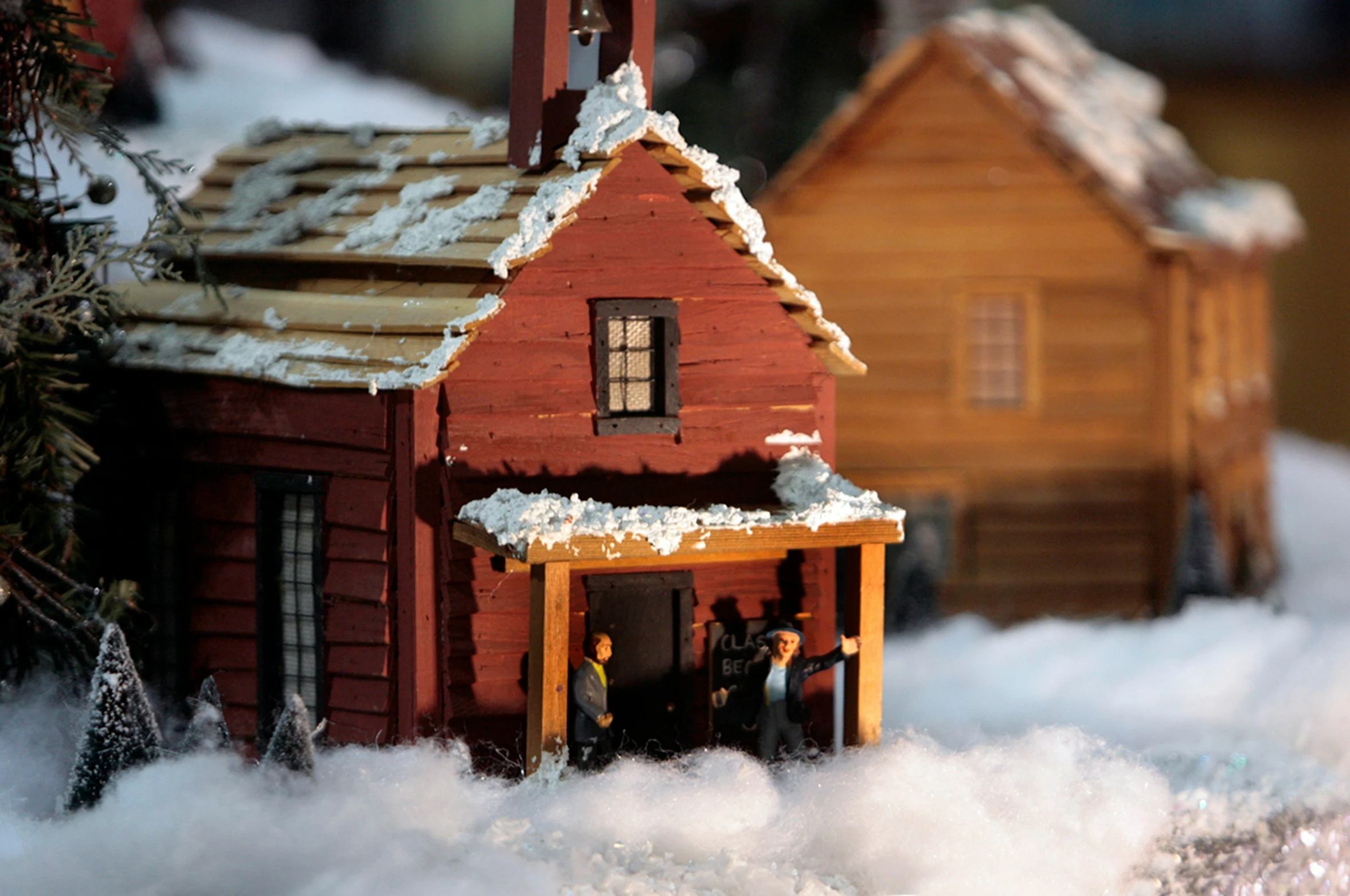 a small house in the clouds surrounded by snow