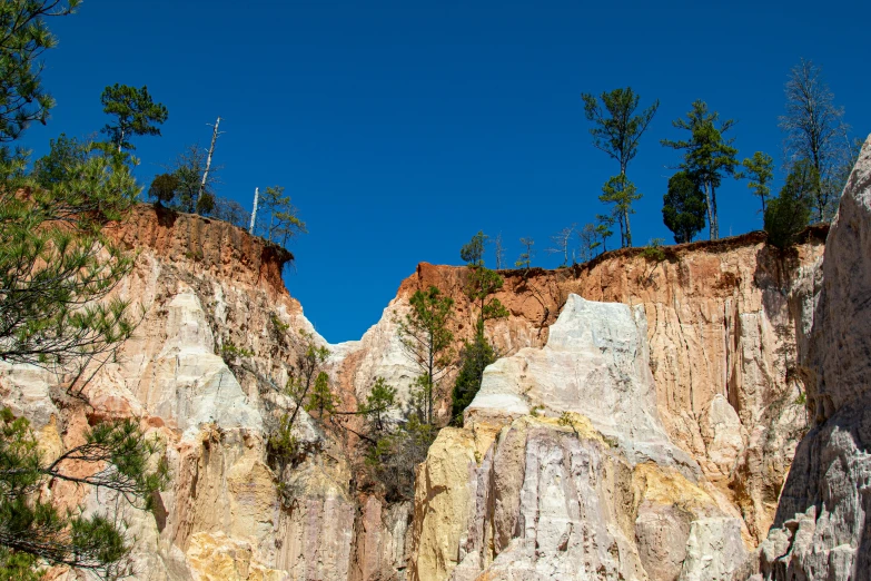 the mountains are steep and clear on a blue sky day