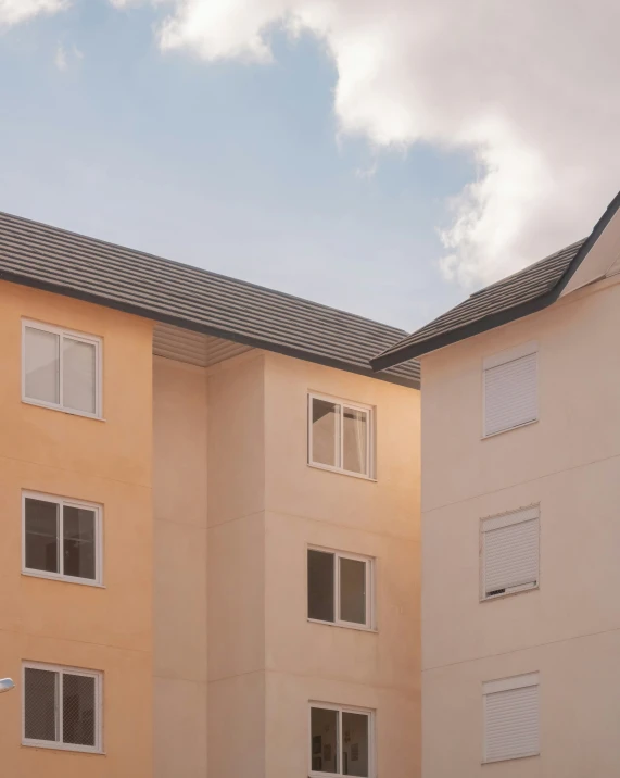 apartment building in the city under the cloudy sky