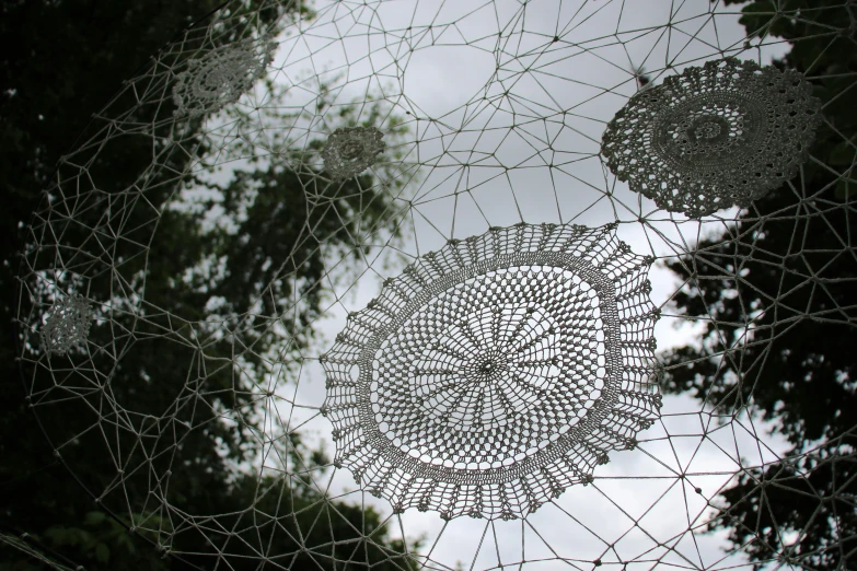 an intricately designed umbrella seen from below