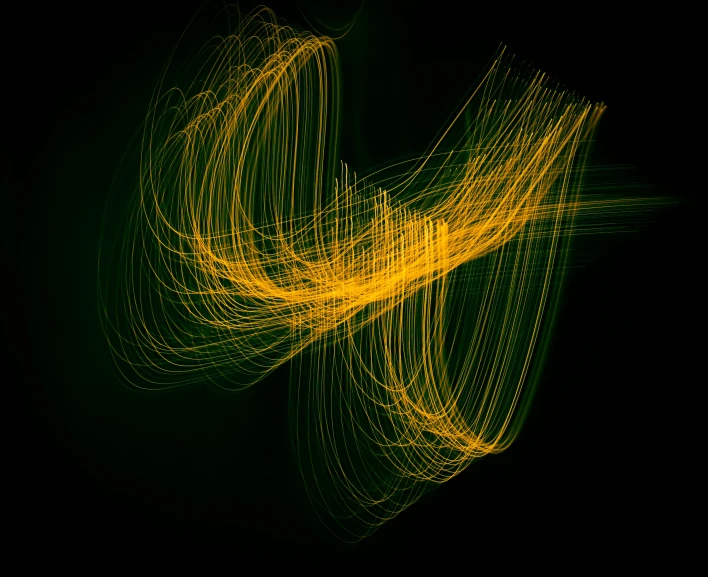 light painting of a swirl of light on a black surface