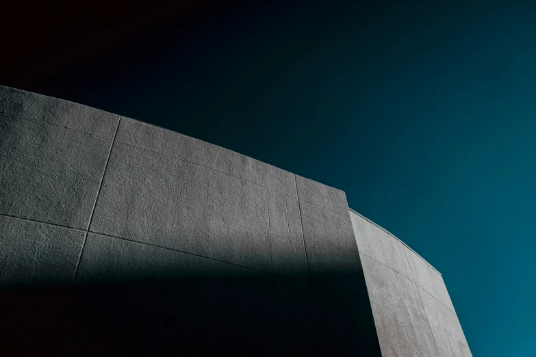 a large concrete block that appears to be half curved