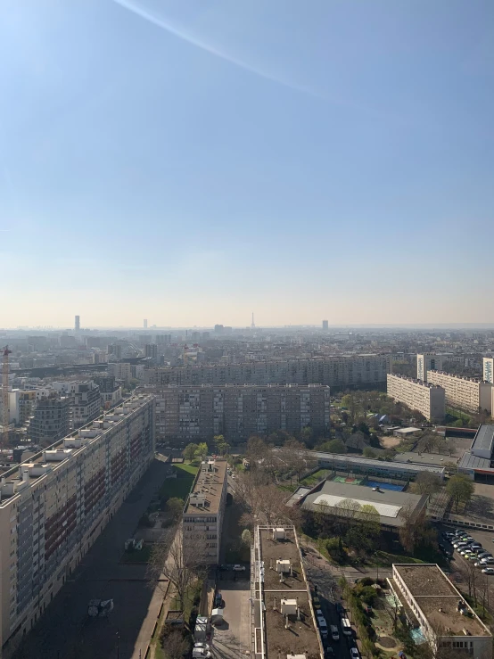 a cityscape with a large amount of buildings and the sky