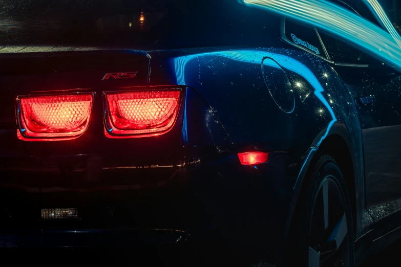 a close up view of the taillights and lights on a car