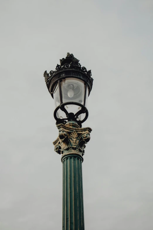 streetlight on pole with ornate decoration on top