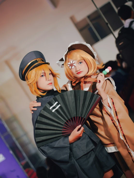 two young ladies are posed as the costumes