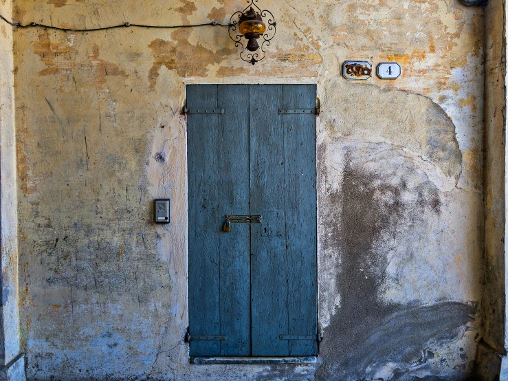 the door and light switch on a building