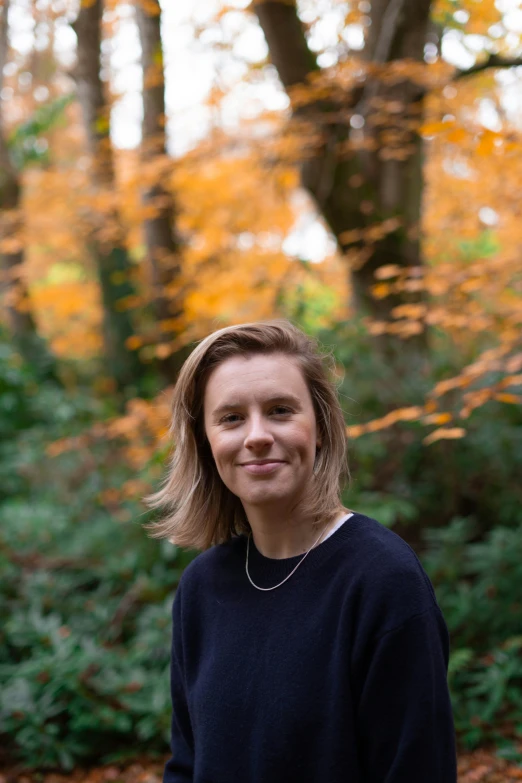 an image of a woman that is smiling for the camera