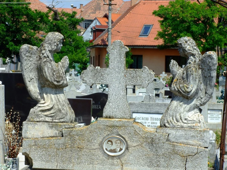 an old stone headstones with carved doves