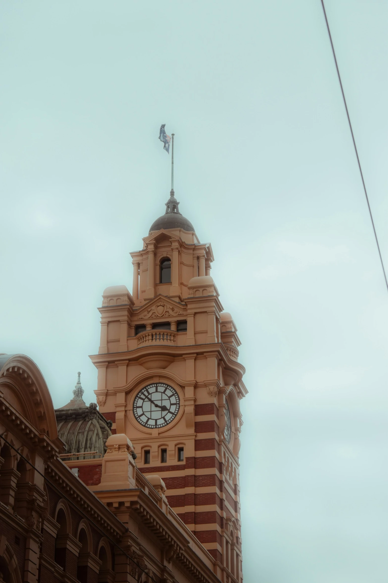 there is a very tall tower with a clock on it