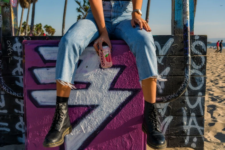 a person sitting on top of a purple object