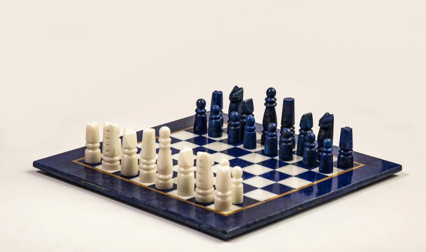 an antique chess set with all black pieces on it