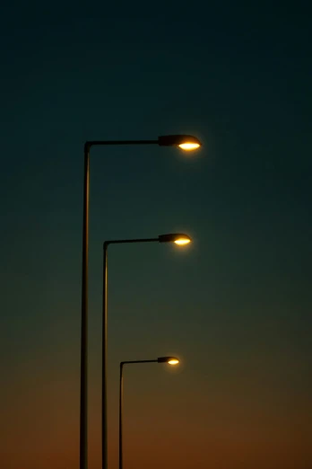 street light and traffic light on the road