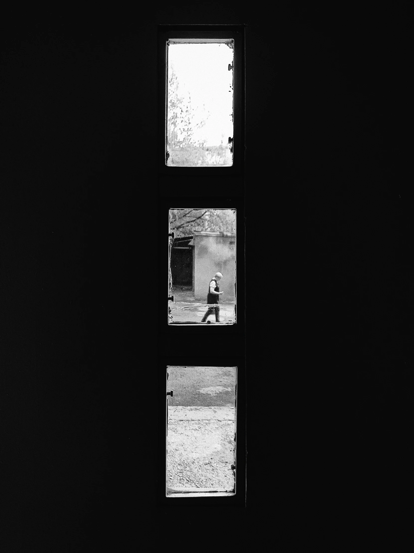 a person standing in front of a window