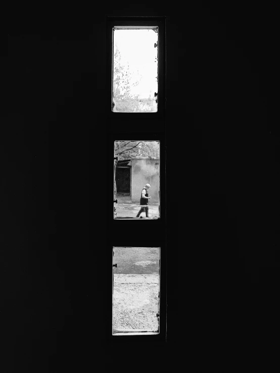 a person standing in front of a window