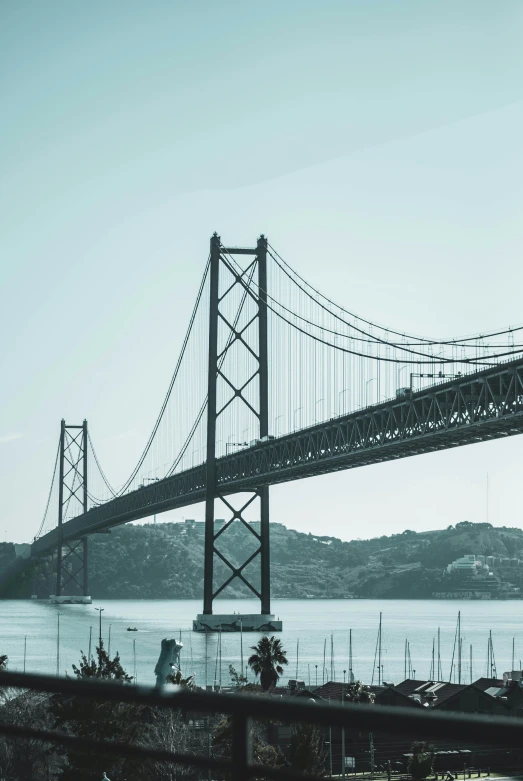 a bridge in the distance with no vehicles crossing it