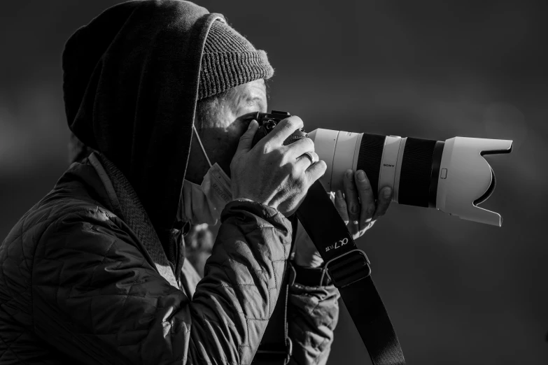 a man is taking pictures with a camera