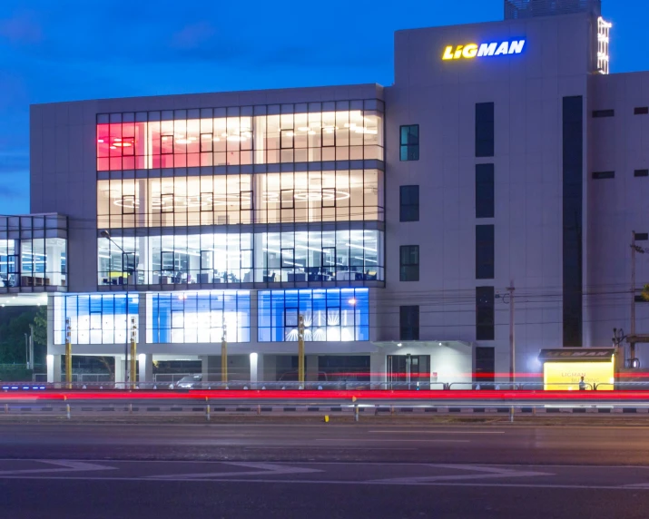 a large building at night with lots of lights