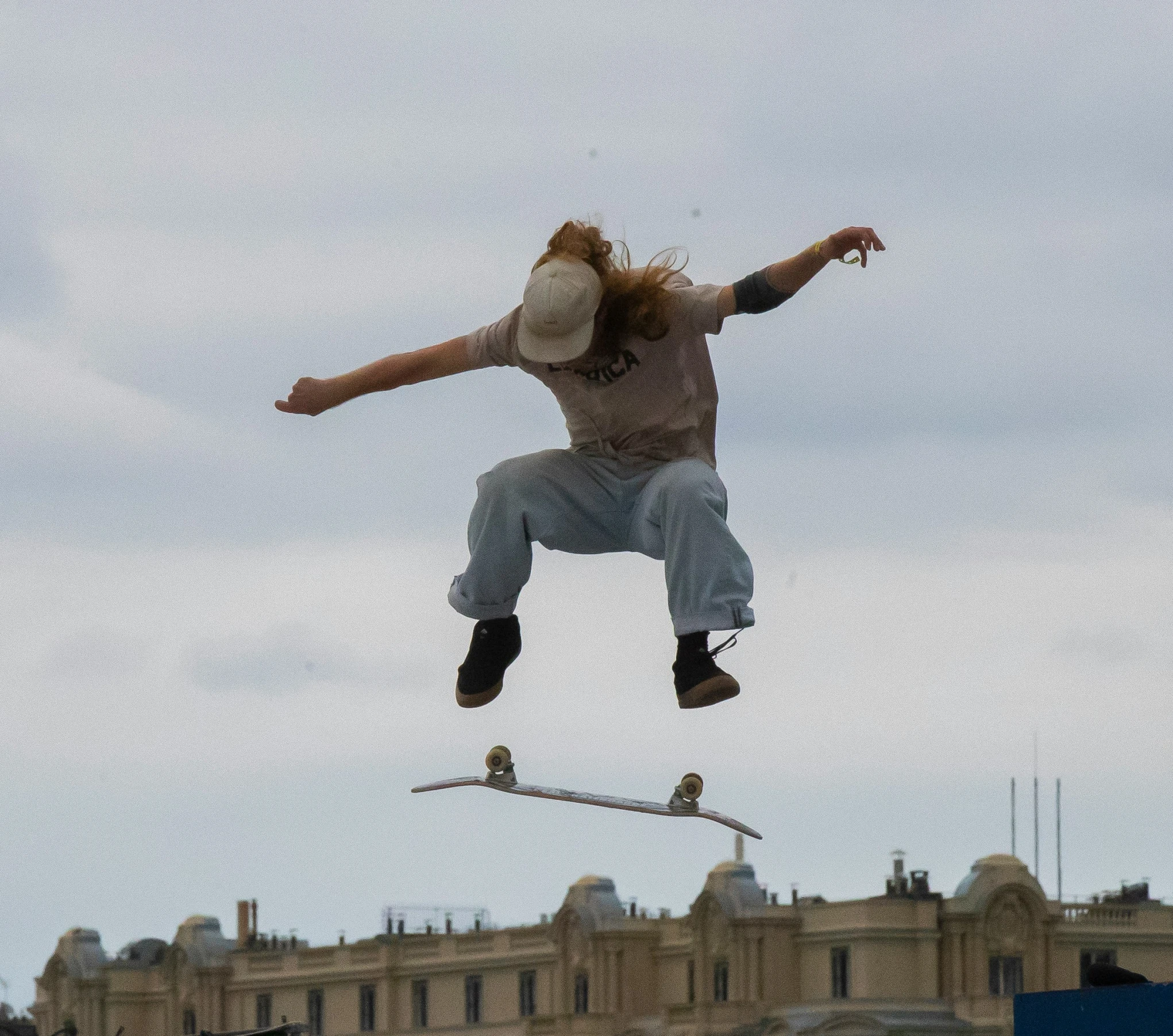 a person flying through the air on a skateboard