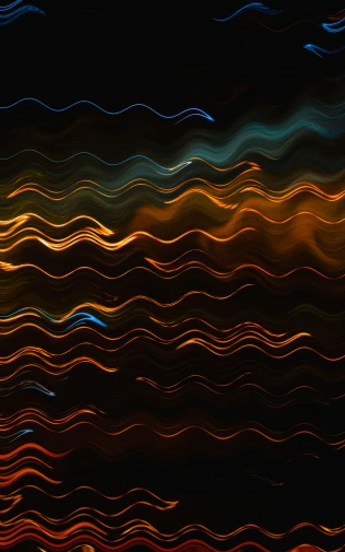 multi colored wavy lines and streaks on black