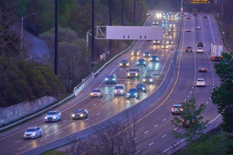 a bunch of traffic at night on the highway