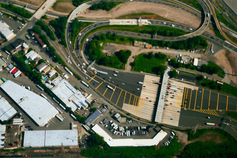 an aerial view of an intersection with parking lot