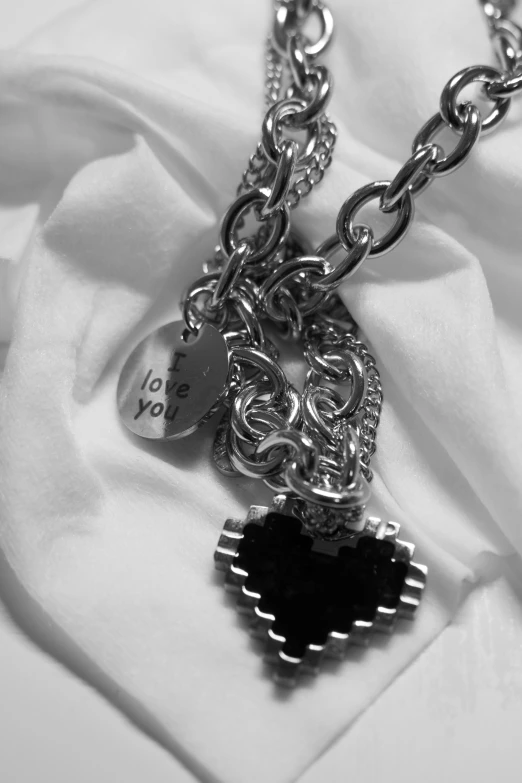 an image of a black and white necklace