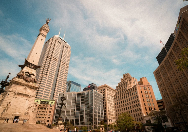 the tall buildings are shown against the blue sky