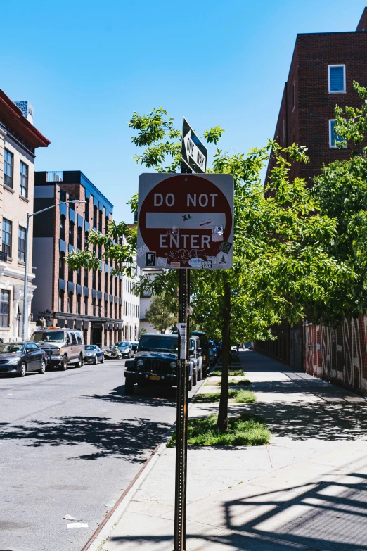 a street sign with words do not enter