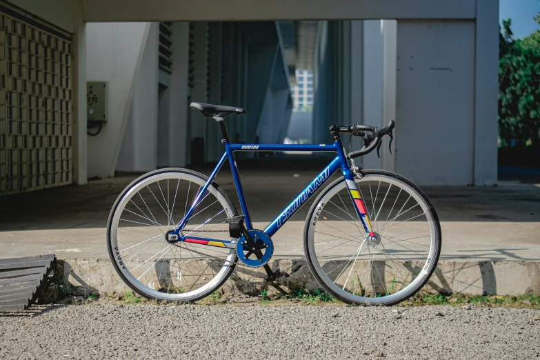 the bike sits on the side of the road