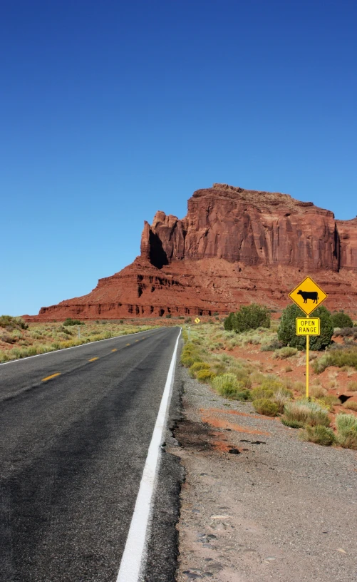 a sign that is on the side of the road