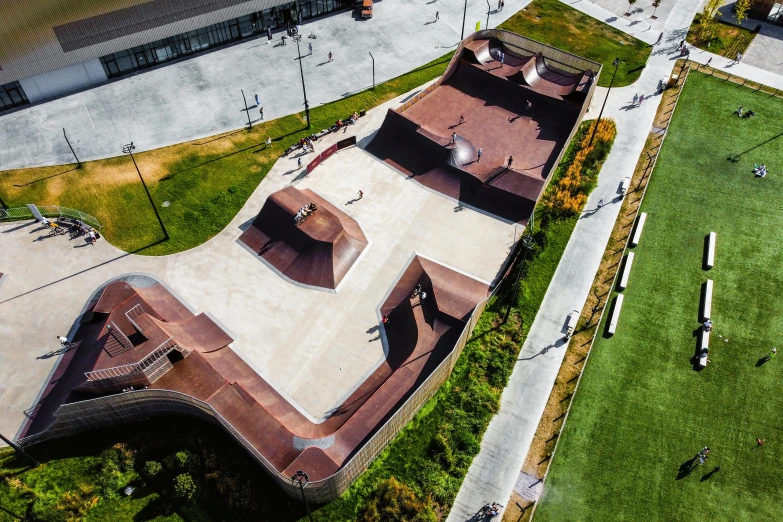 an aerial view of a skate park with people