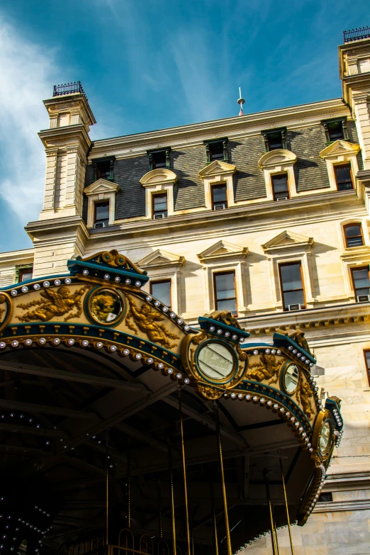 an elaborate building with a big clock tower