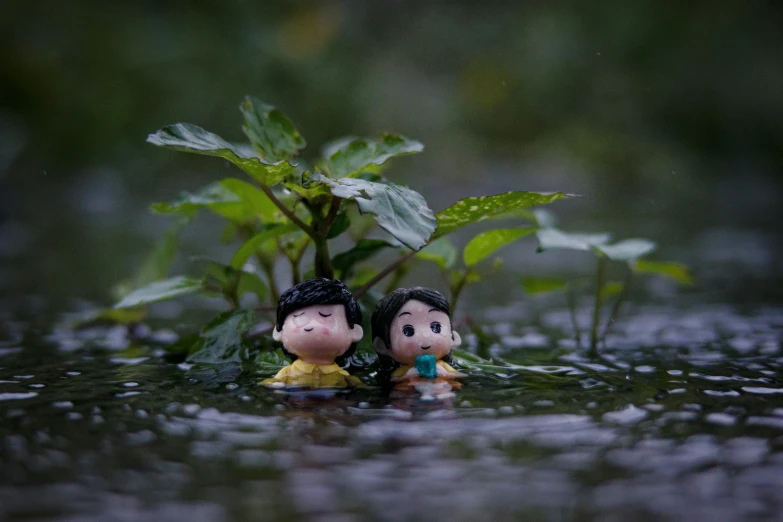 the couple is posed next to each other in the rain