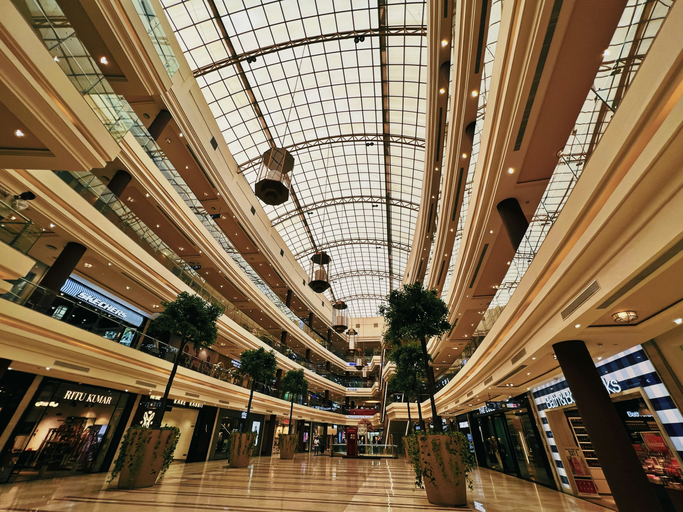 large windows, and high ceilings inside a shopping mall