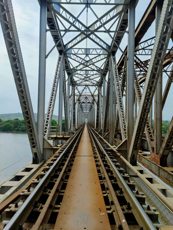 a view down the track in to an old metal bridge